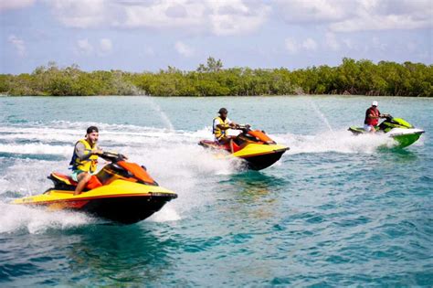 a group of people on jet skis
