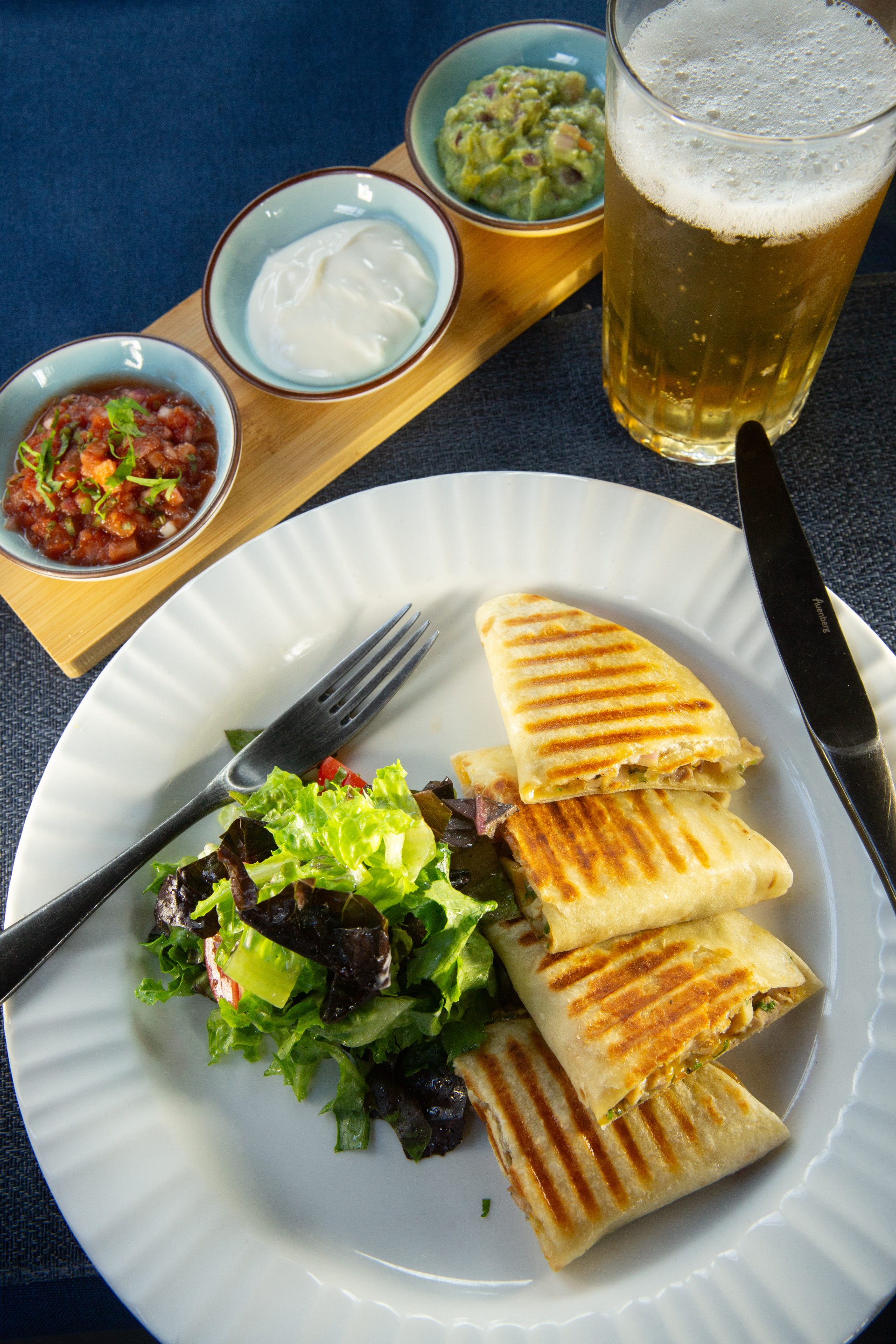 a plate of food and a drink