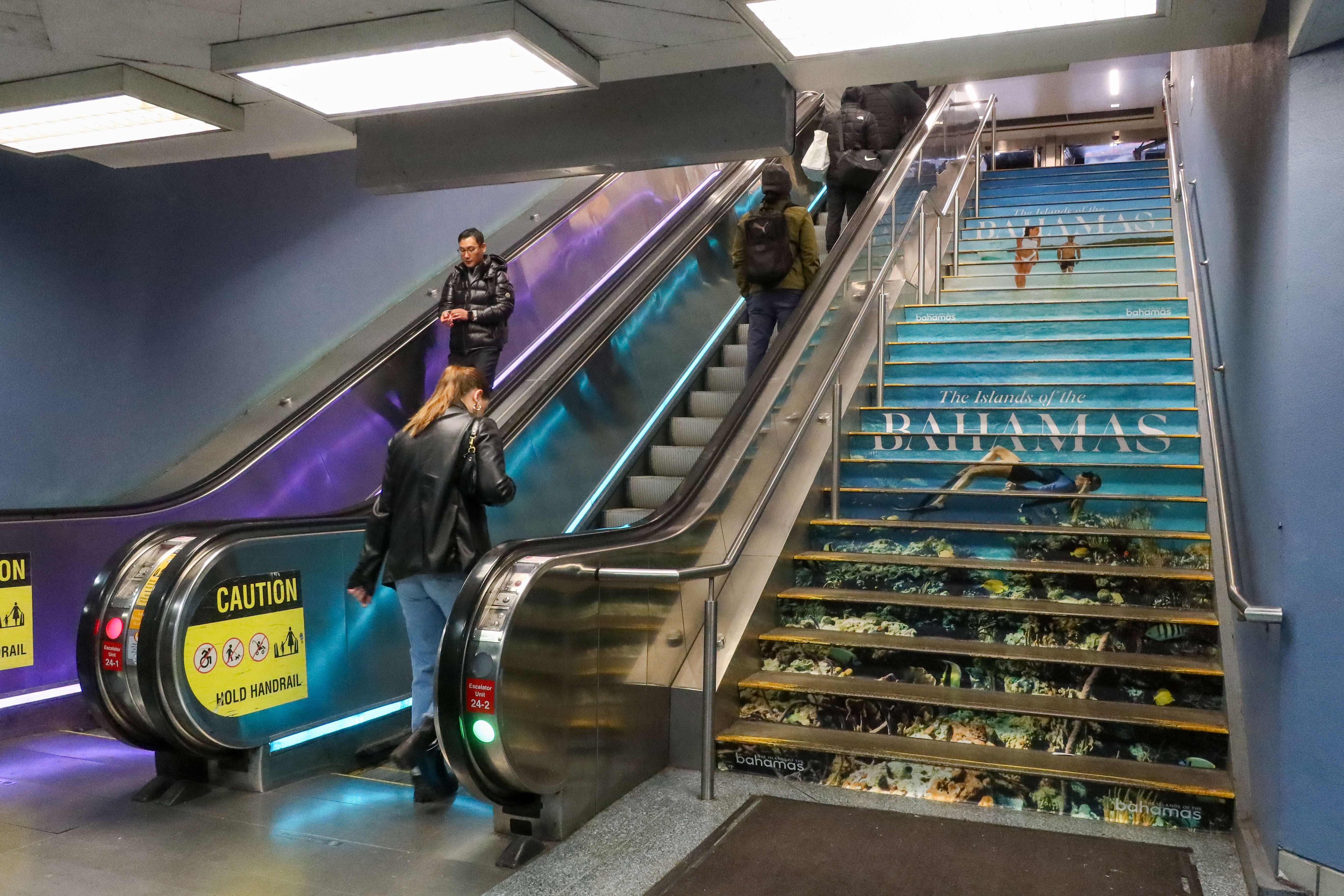 people standing on a staircase