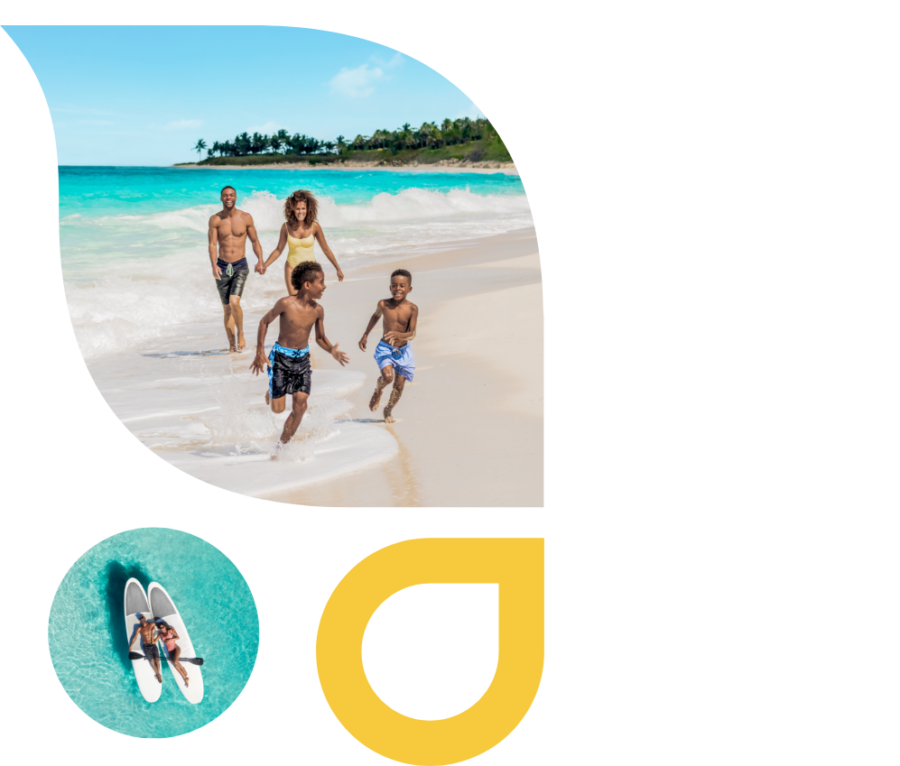 a group of people running on a beach