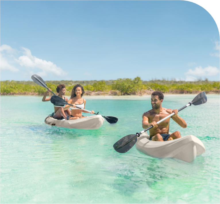 a group of people in kayaks on a body of water