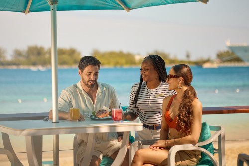 a group of people sitting at a table