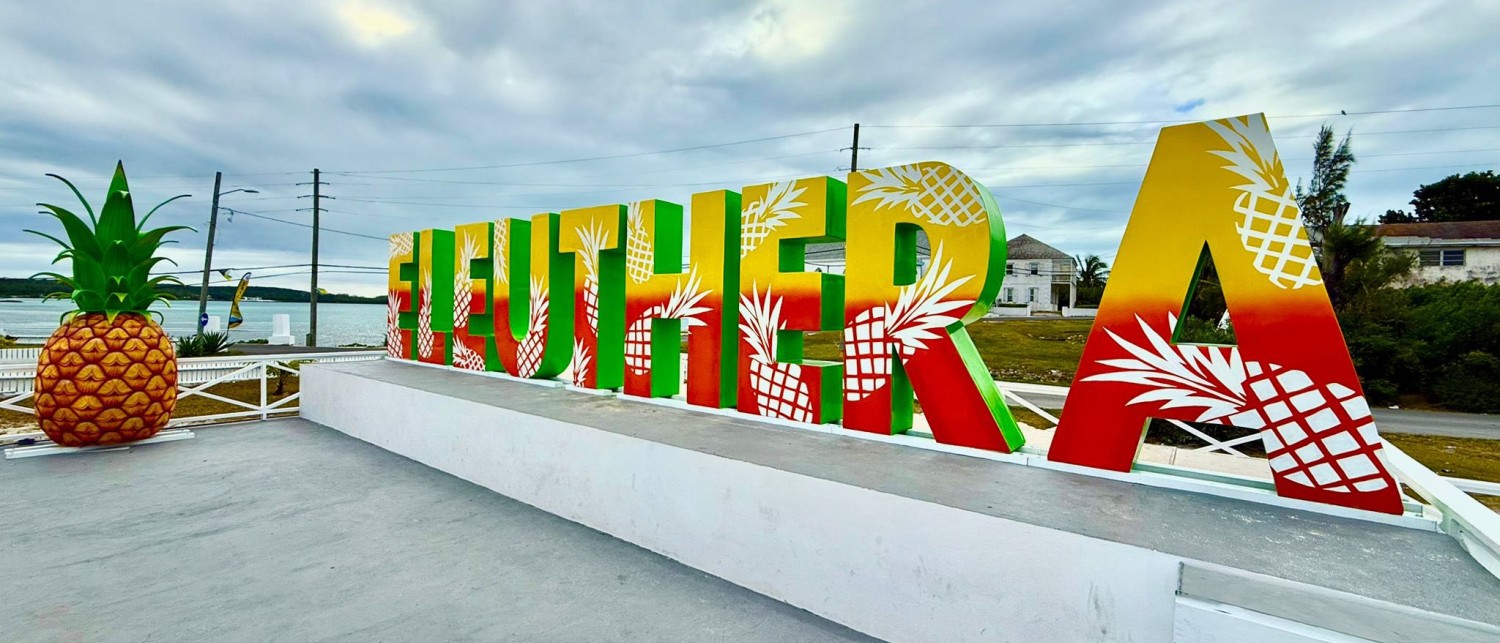 a sign on a concrete platform