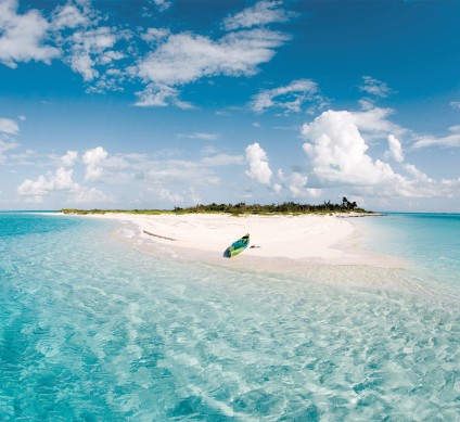 a small island with a surfboard on it