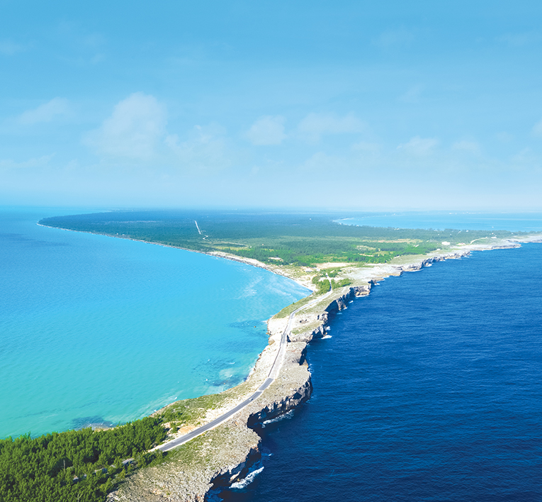 a road next to the water