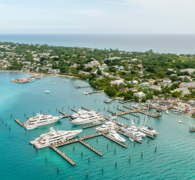 yachts and boats docked at a marina