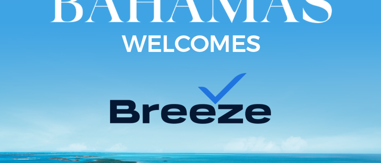 a blue ocean with islands and boats