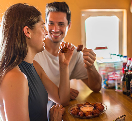 a man and woman eating food