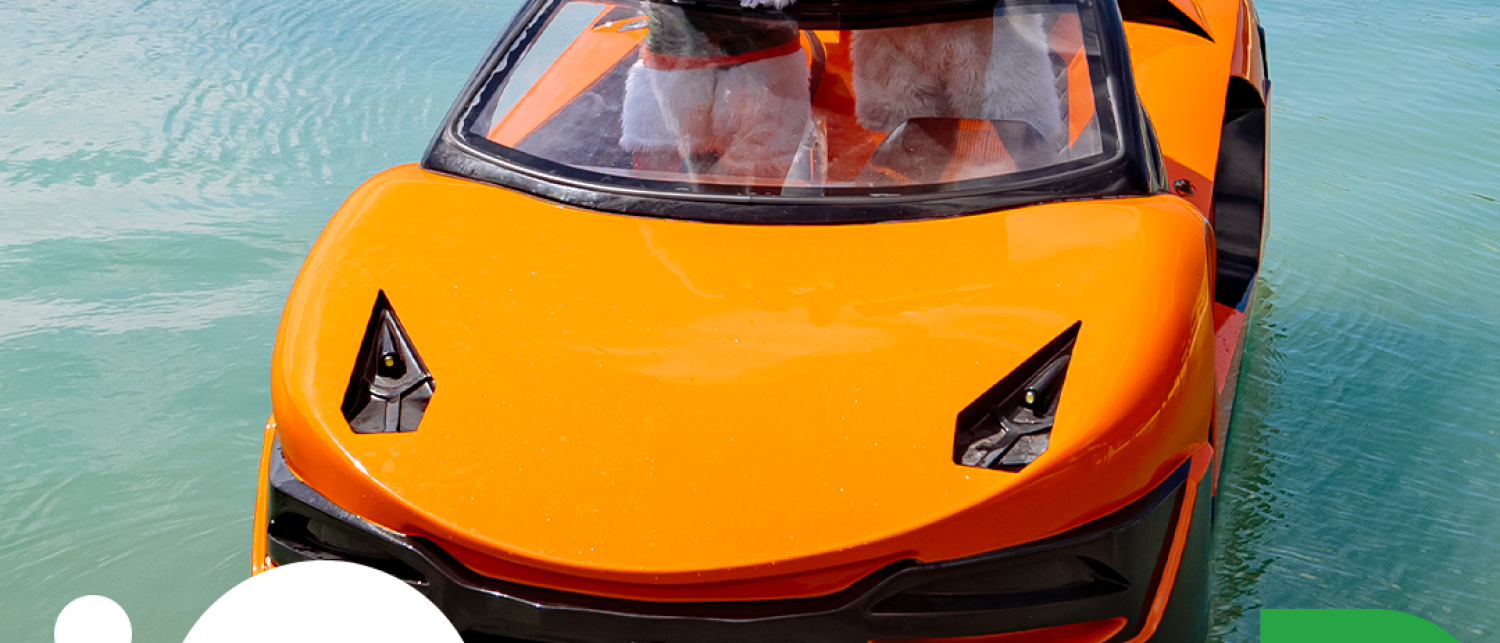 two people in clothing on a boat