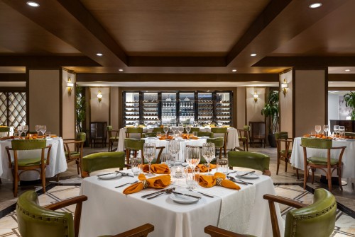 a restaurant with tables and chairs