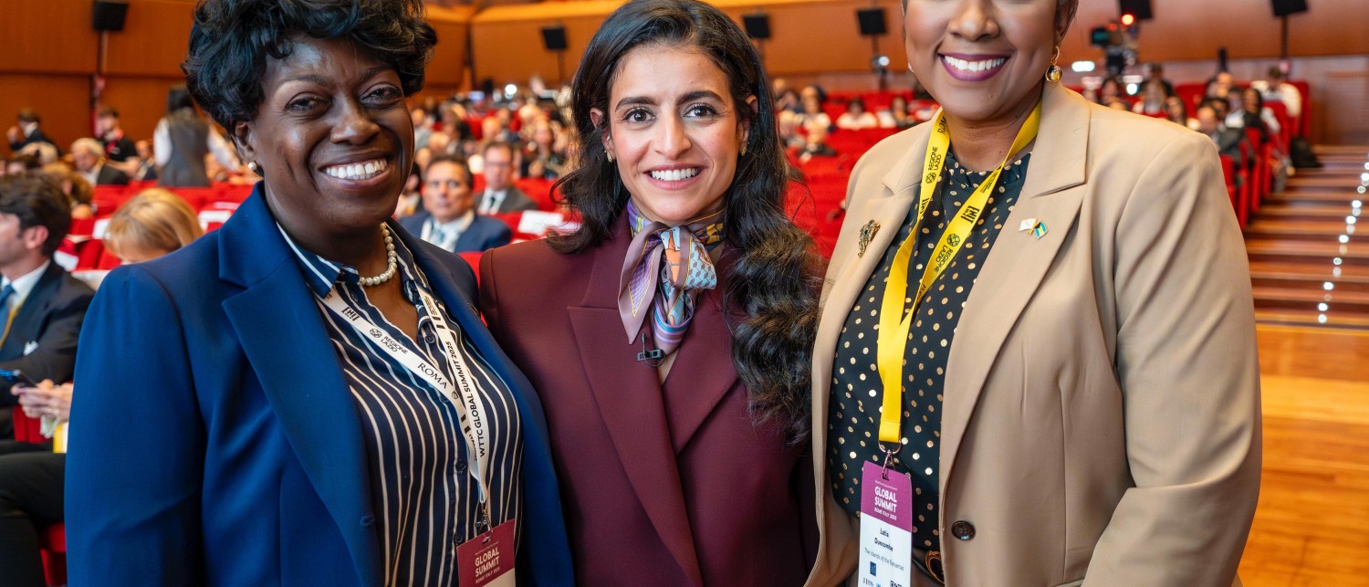 a group of women smiling at camera
