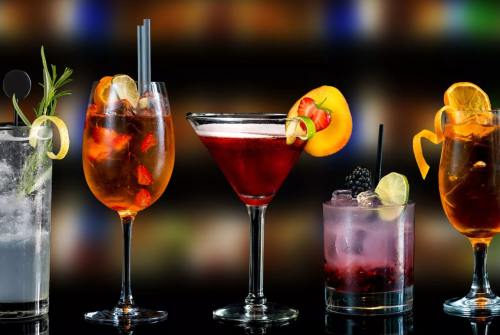 a group of drinks in glasses