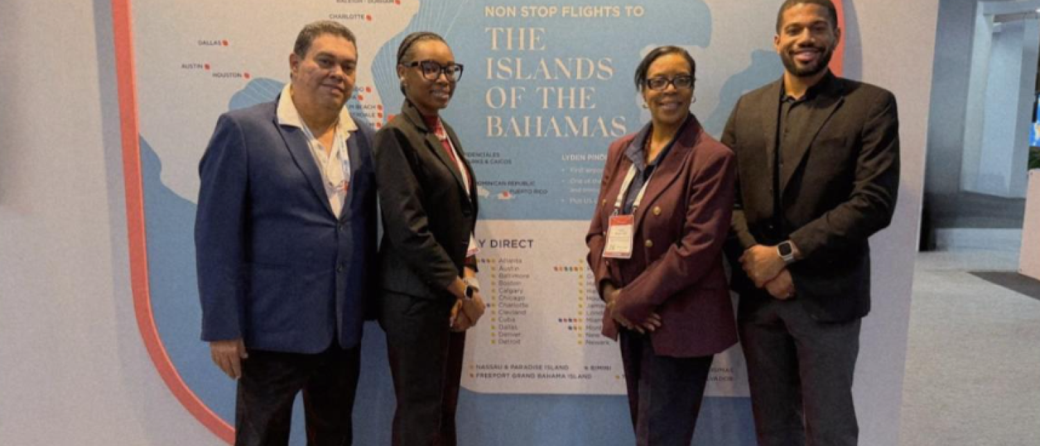 a group of people standing in front of a map