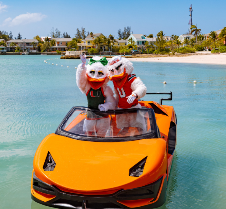 two people in clothing on a boat
