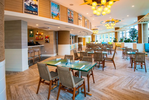 a restaurant with tables and chairs