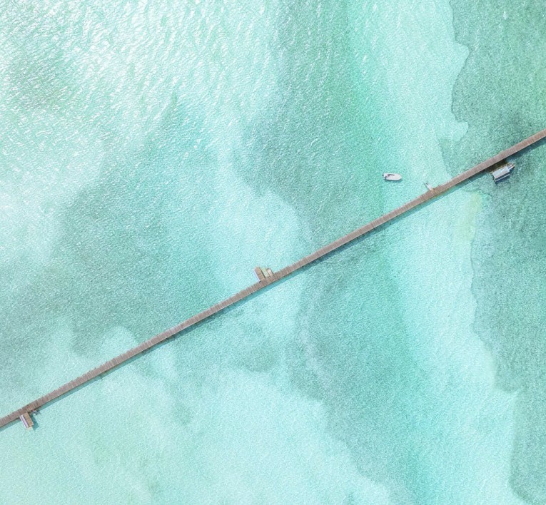 a long dock in the water