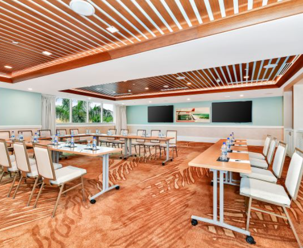 a room with tables and chairs