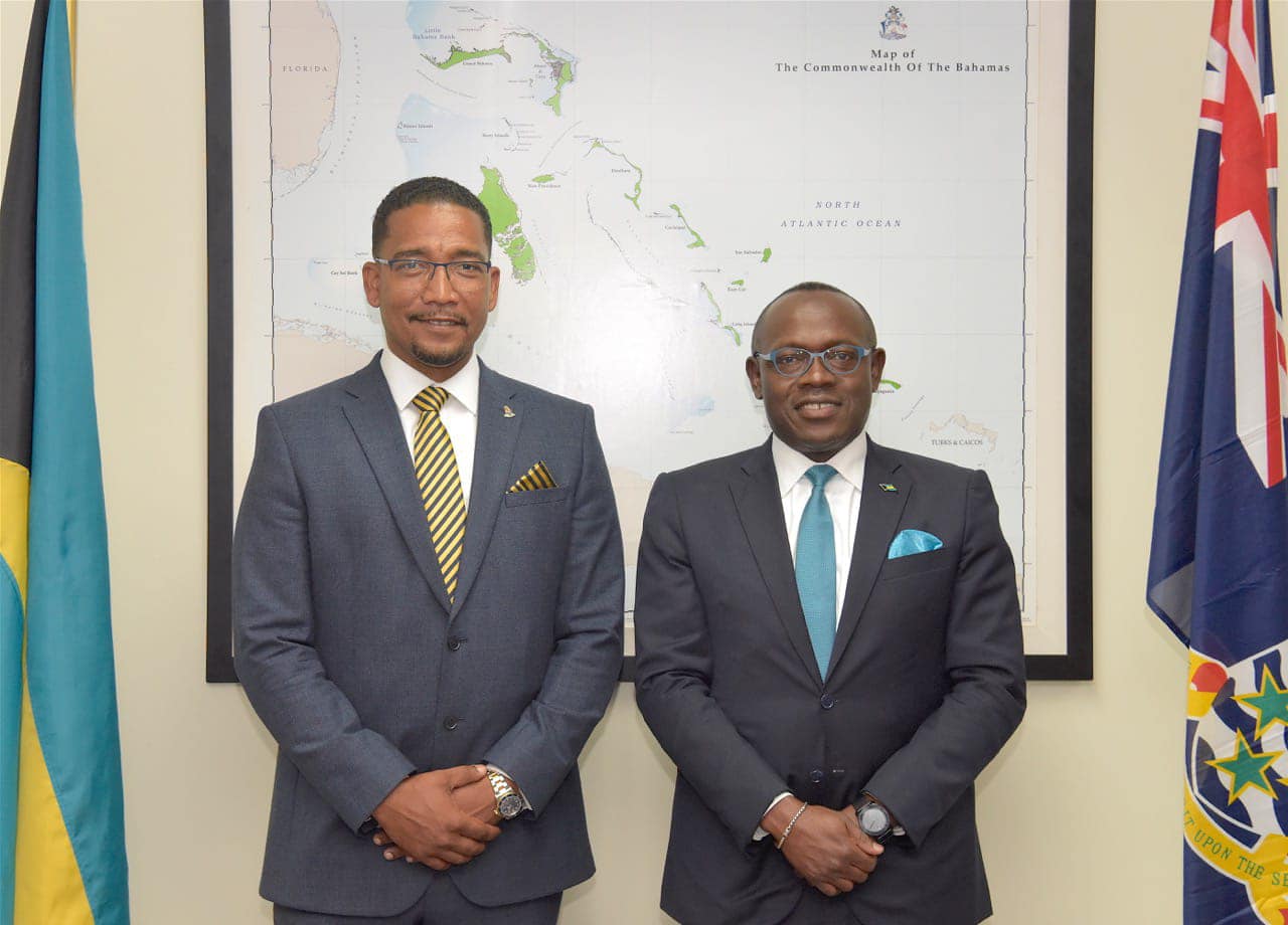 dpm and cayman minister