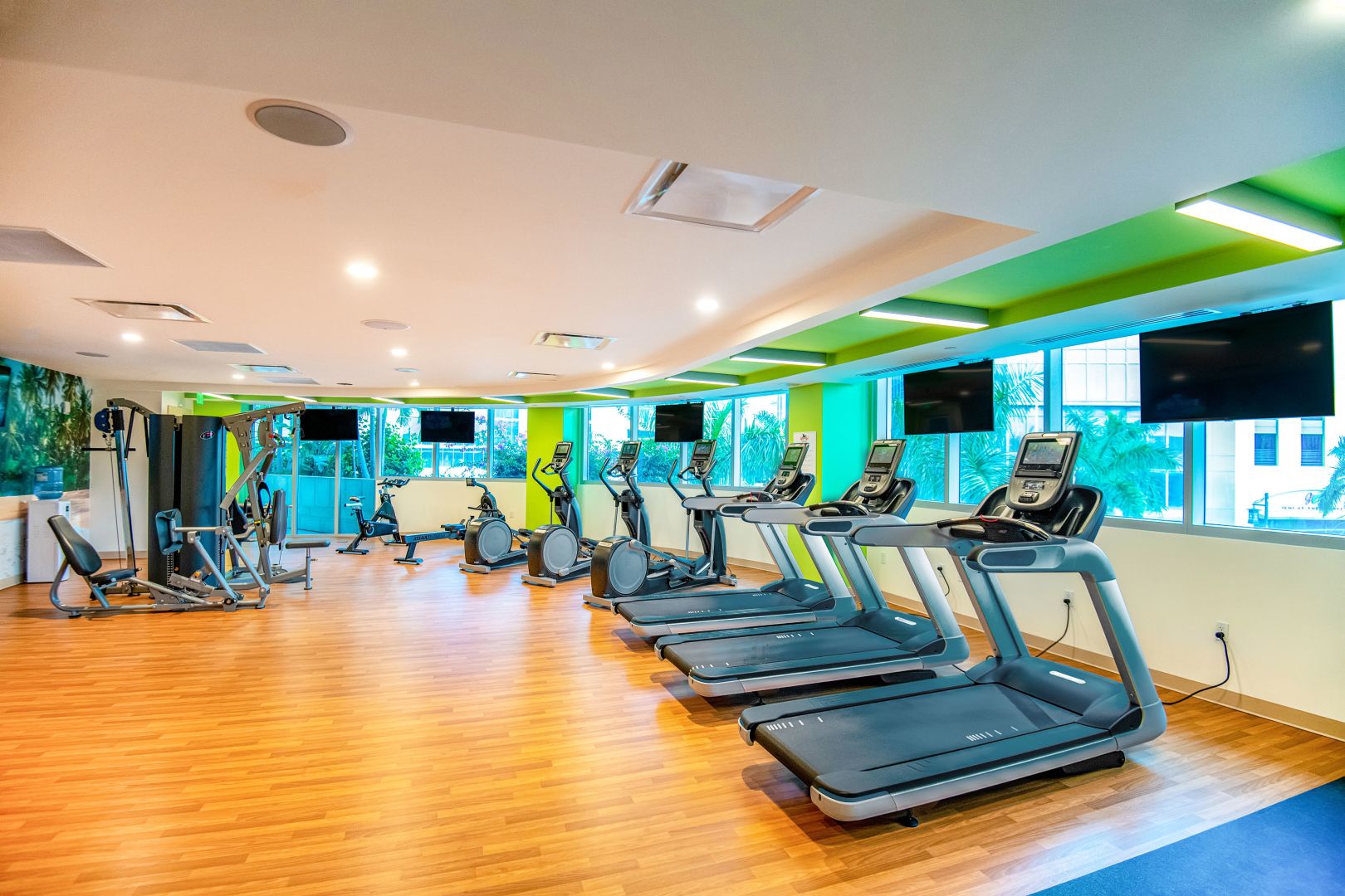 a room with treadmills and exercise machines