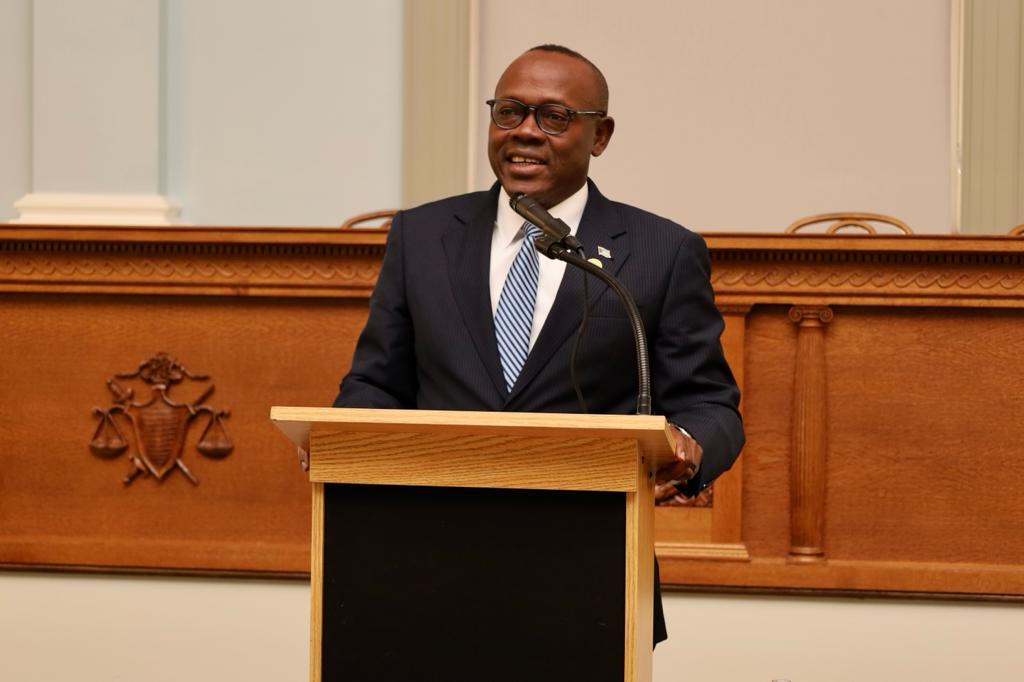 a man standing at a podium