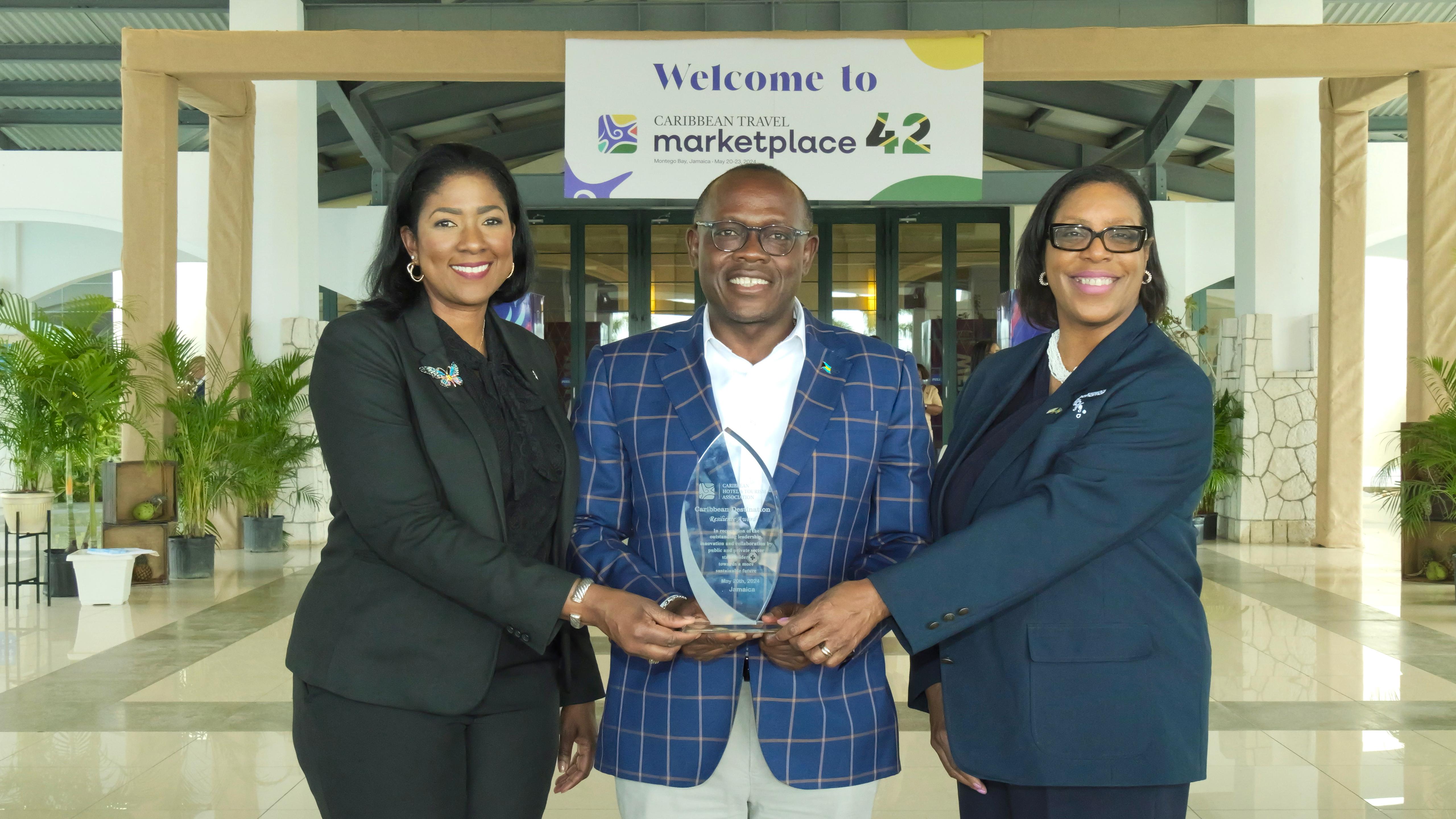 Director General Latia Duncombe, Deputy Prime Minister, The Hon.I. Chester Cooper , Deputy Director Valery Brown- Alice