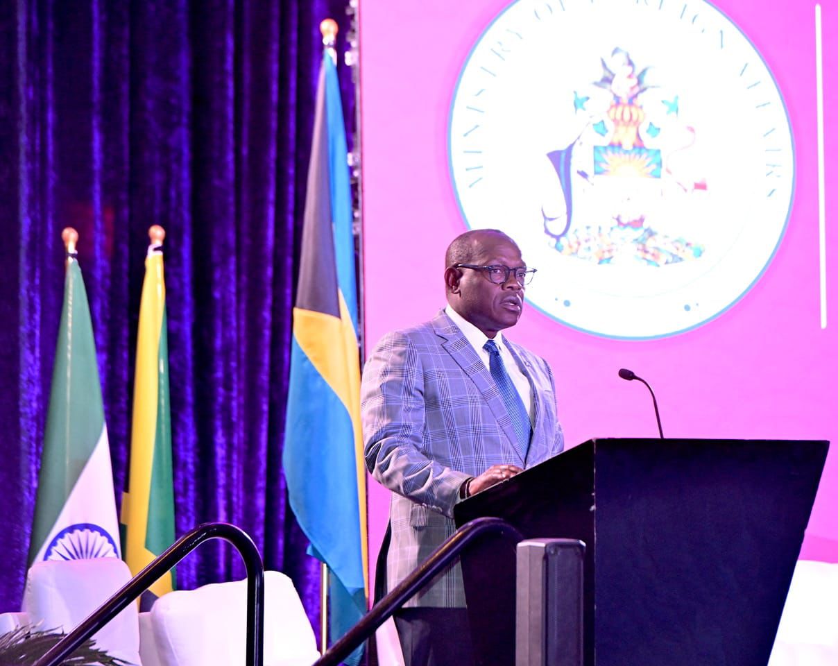 a man standing at a podium