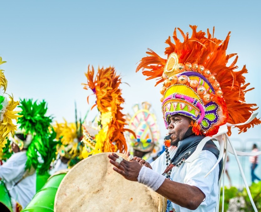 a group of people wearing colorful clothing