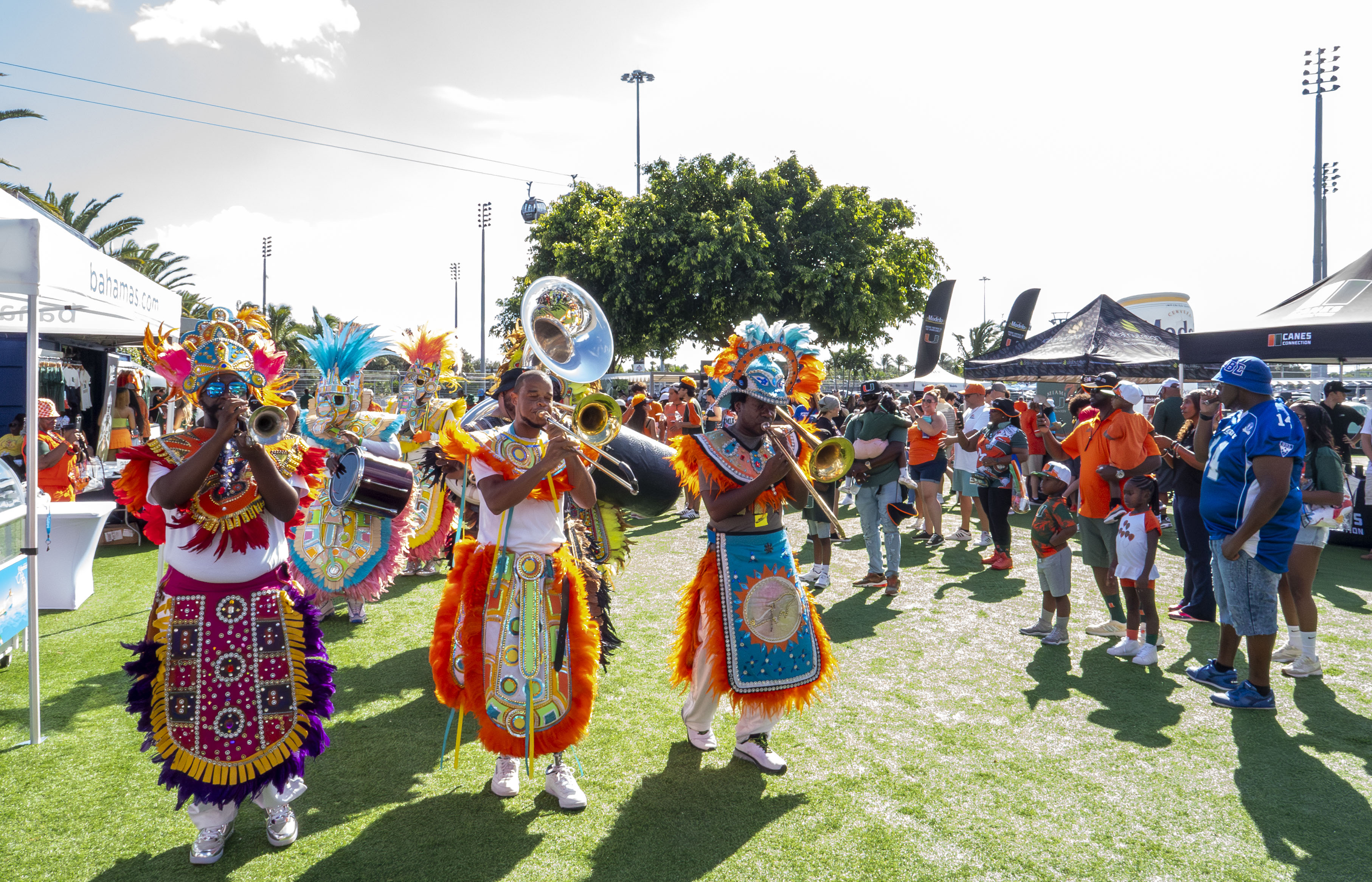 a group of people in clothing playing instruments